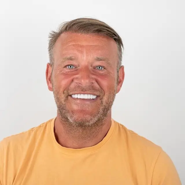 Precious Dental patient smiling after treatment