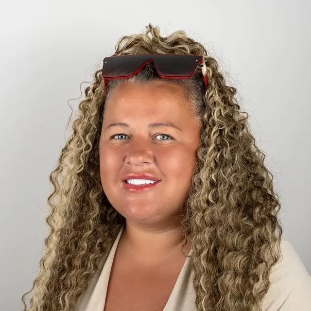 Precious Dental patient smiling after treatment